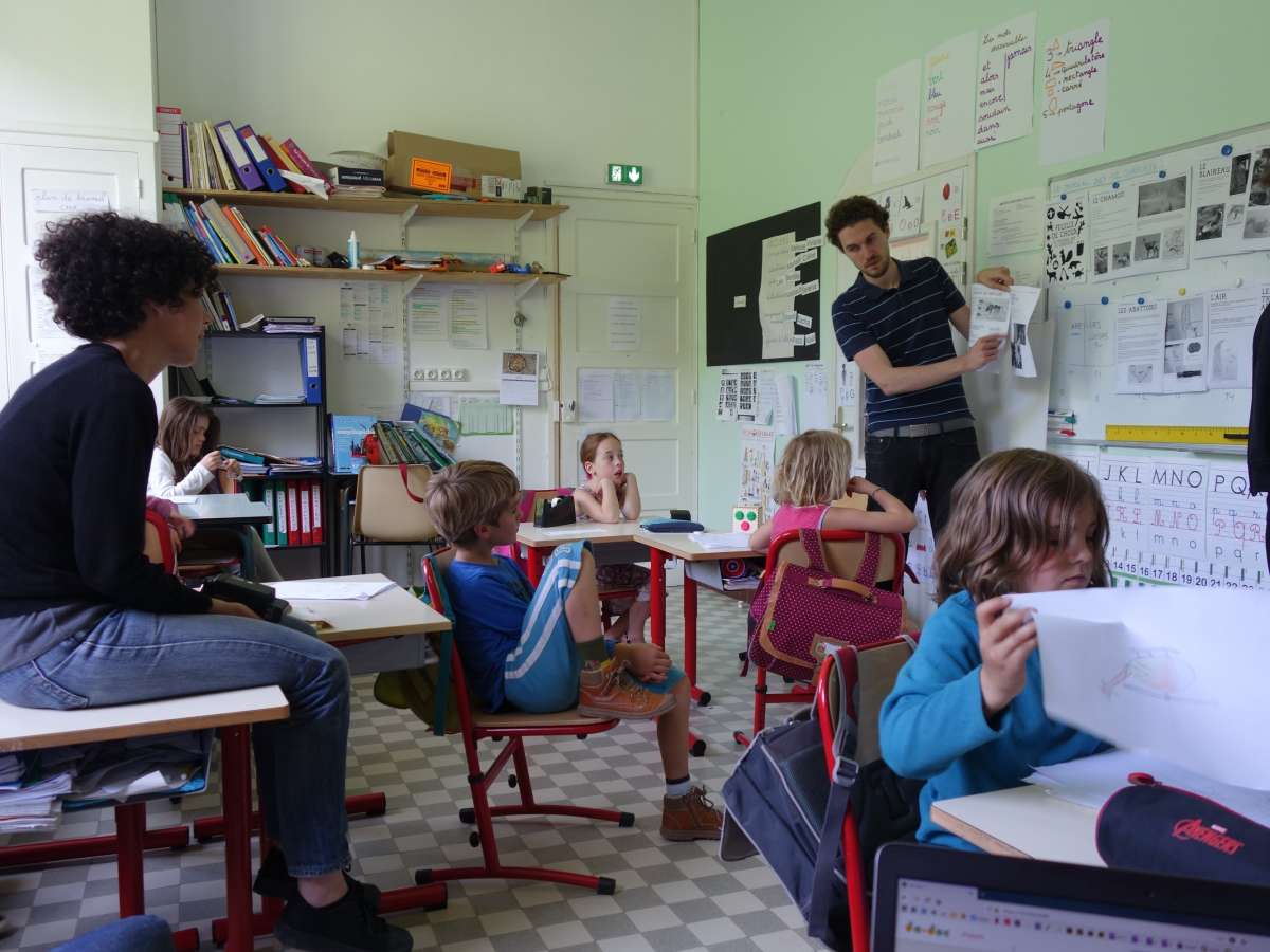 Editorial meeting, reviewing the newspaper&rsquo;s progress